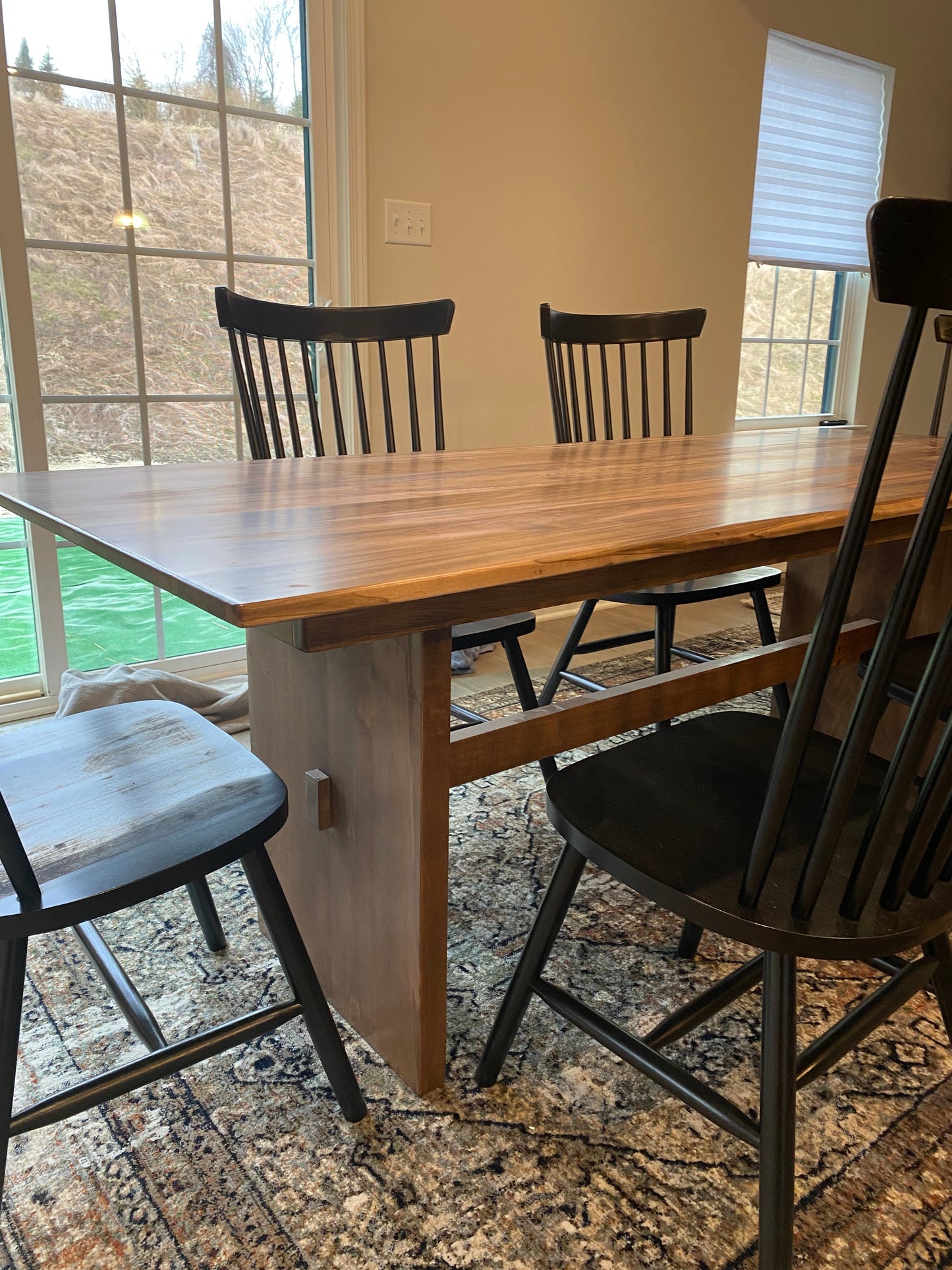 Farmhouse Pedestal Dining Table Crafted From Rough Cut Wood