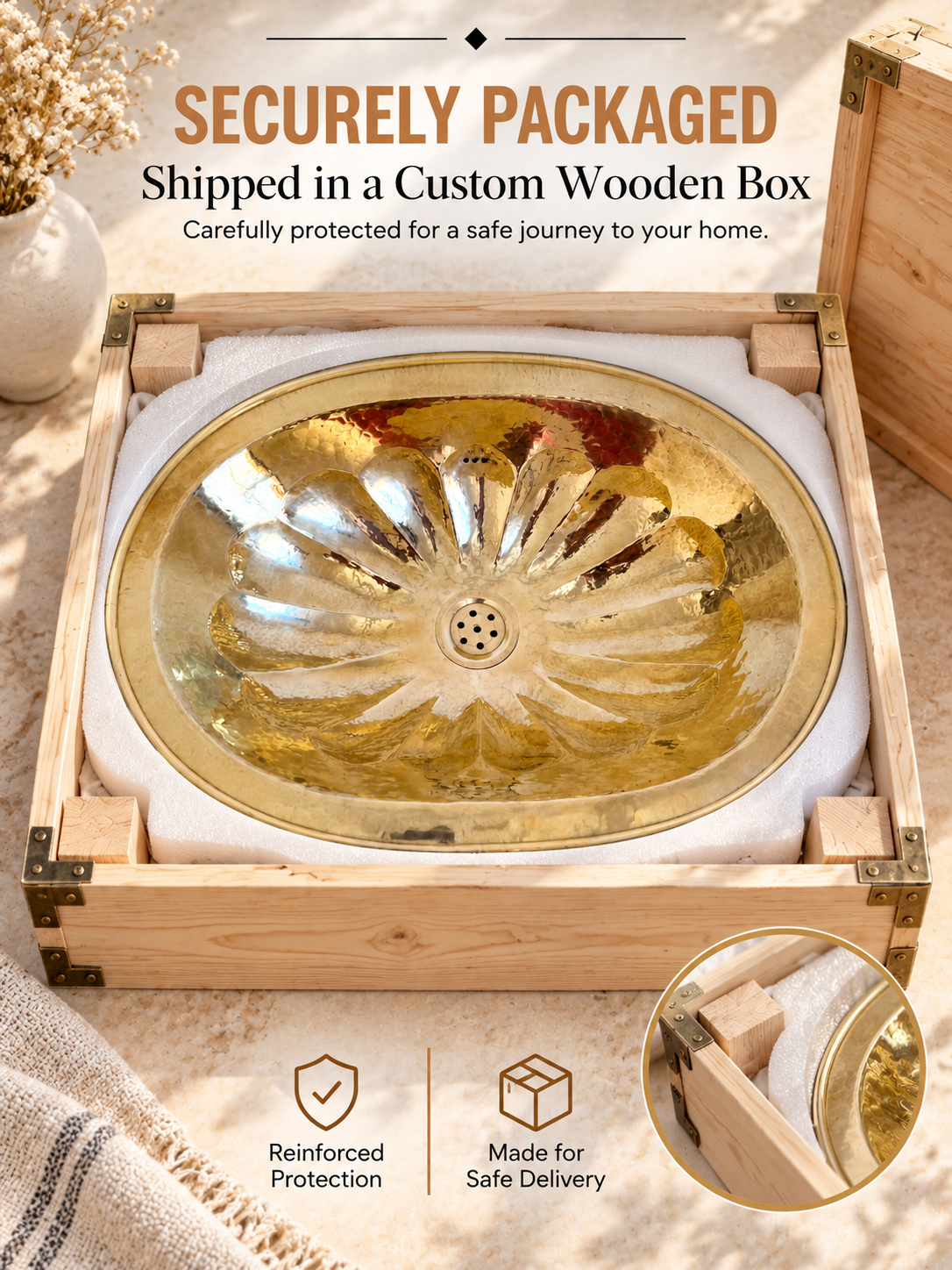Brass flower-pattern sink protected by fitted foam in a wooden shipping box, with text highlighting reinforced packaging and safe delivery.