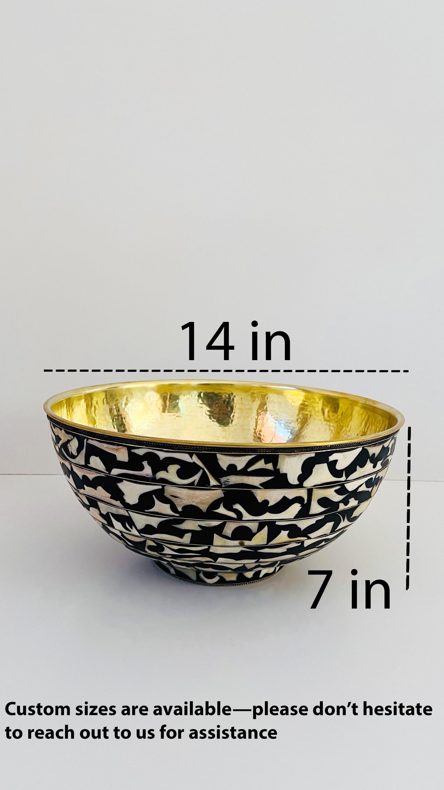 a gold and black basin is shown with measurements