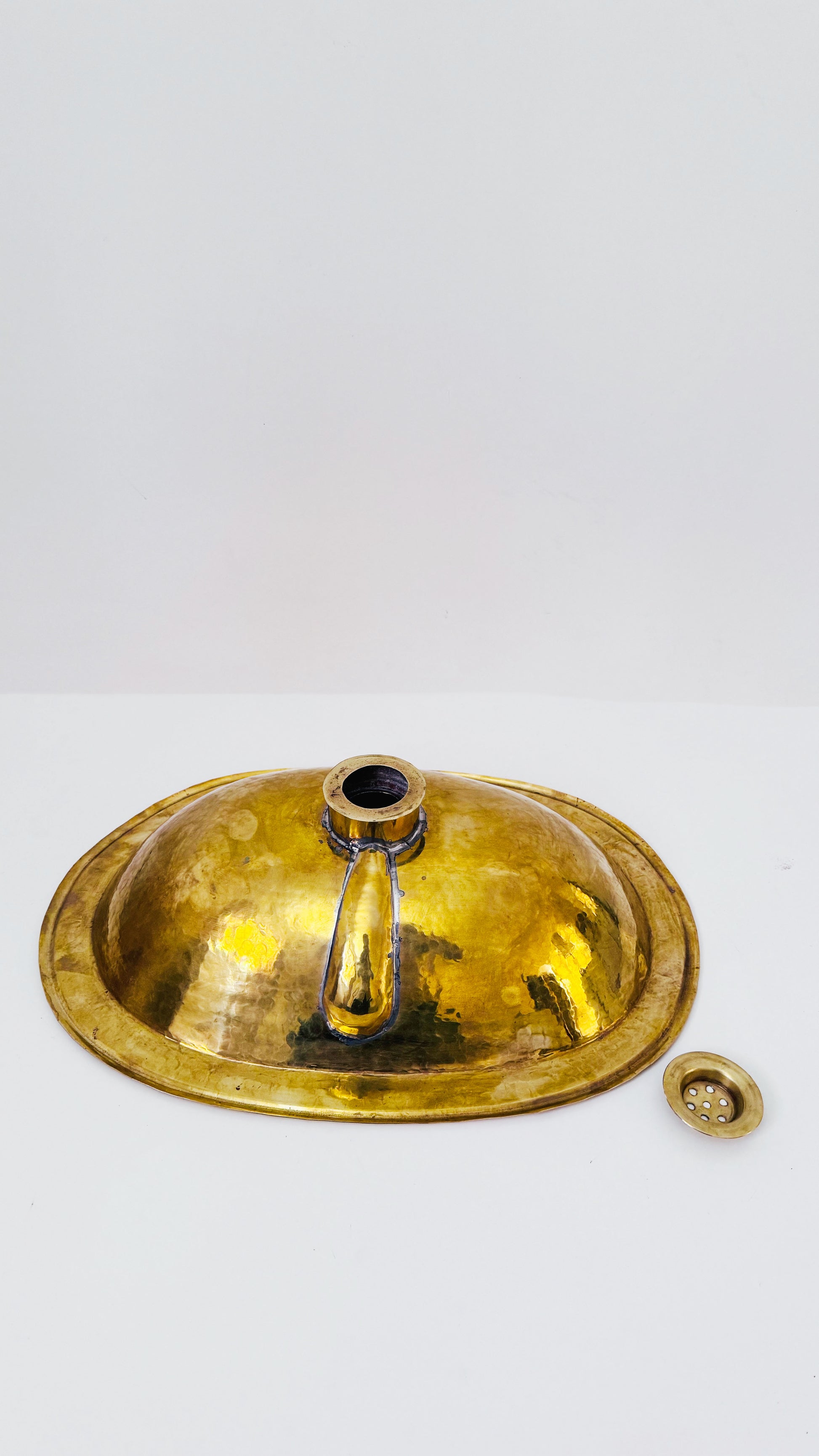 the back of  Brass Oval Sink