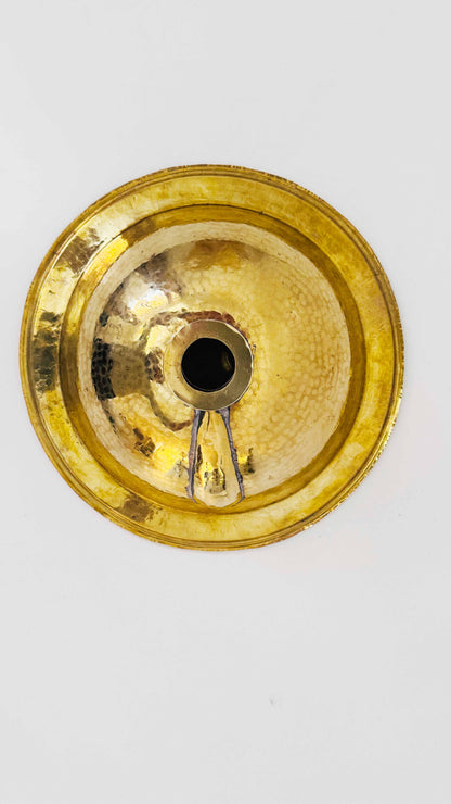 the back of brass sink