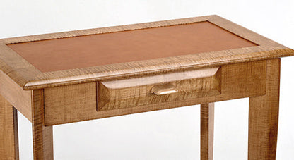 Wooden table with a glass top on a white background