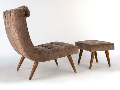Brown upholstered chair and ottoman on a white background