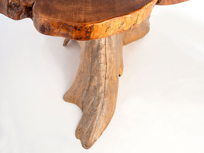 Wooden table with natural edge design on a white background
