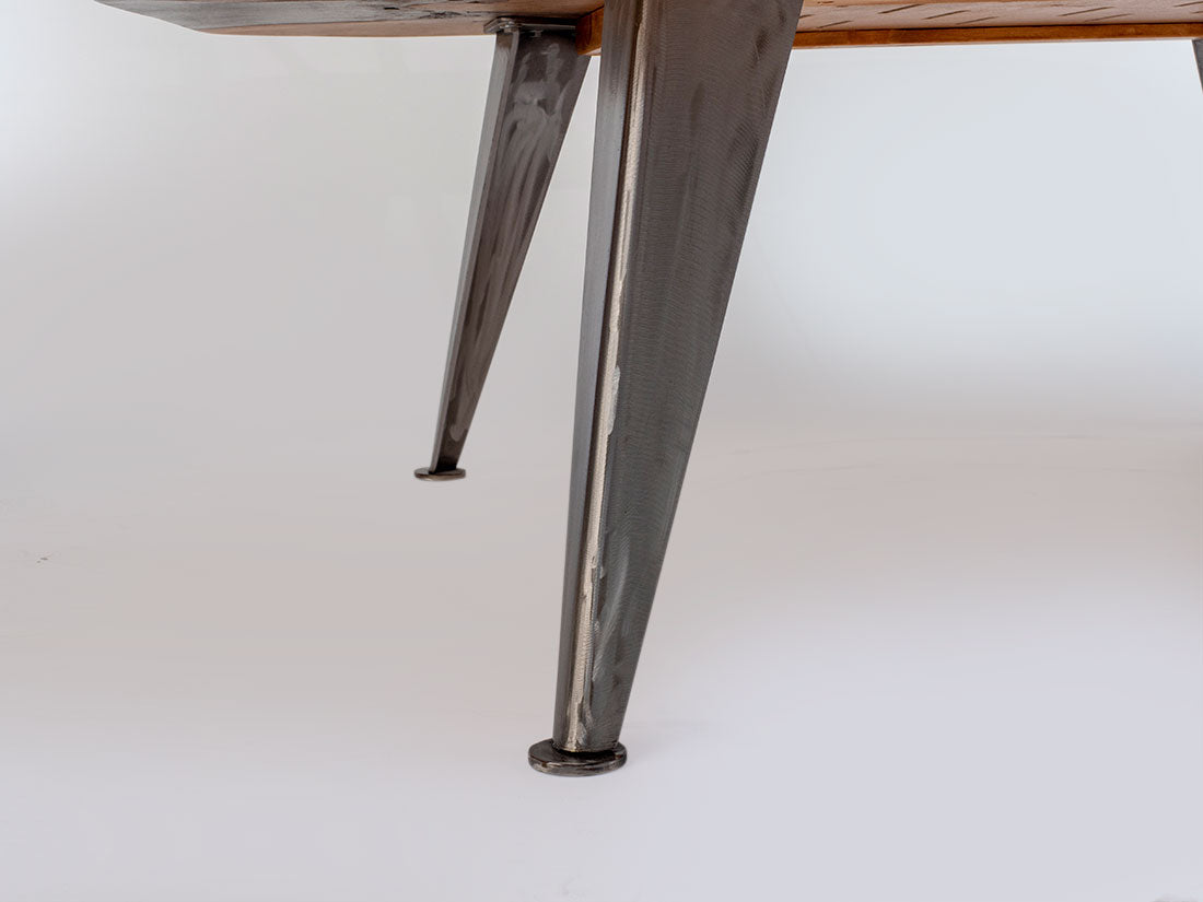 Metal table leg on a white background