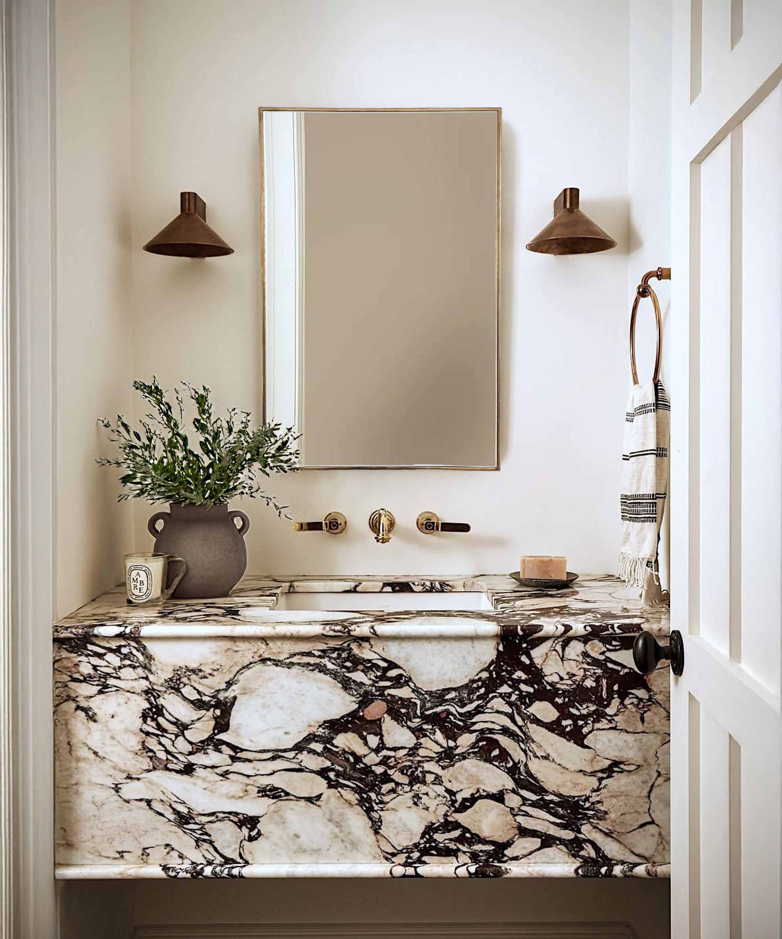 brass rectangular mirror on powder room