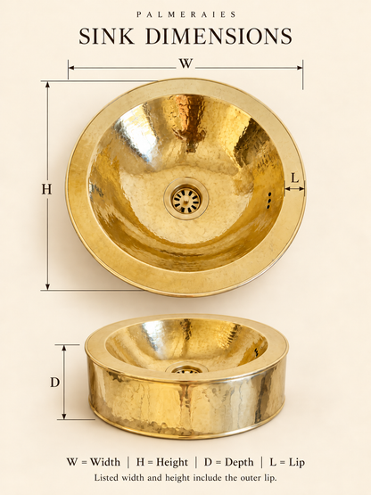 Dimension diagram of a round hammered brass sink with a cylindrical exterior and matching drain, showing top and side views labeled width, height, depth, and lip. Width and height include the outer lip.