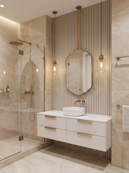 Suspended scalloped brass mirror above a modern white vanity with warm brass fixtures and fluted wall panels.
