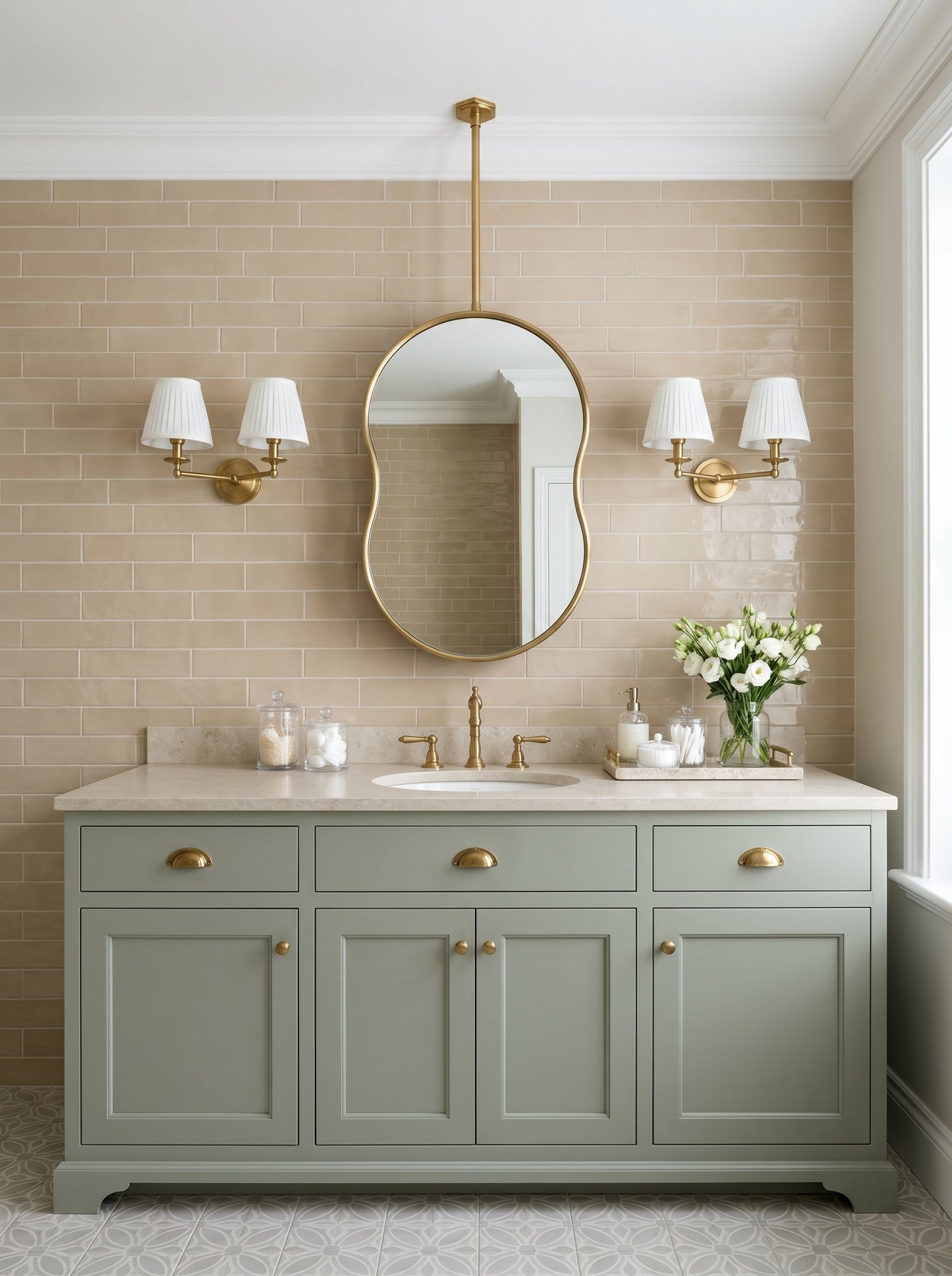 Ceiling-mounted pebble brass mirror with handcrafted gold frame in a contemporary bathroom.