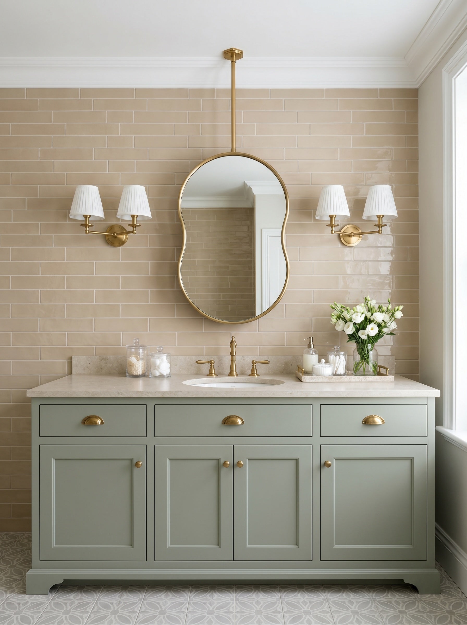 Ceiling-mounted pebble brass mirror with handcrafted gold frame in a contemporary bathroom.