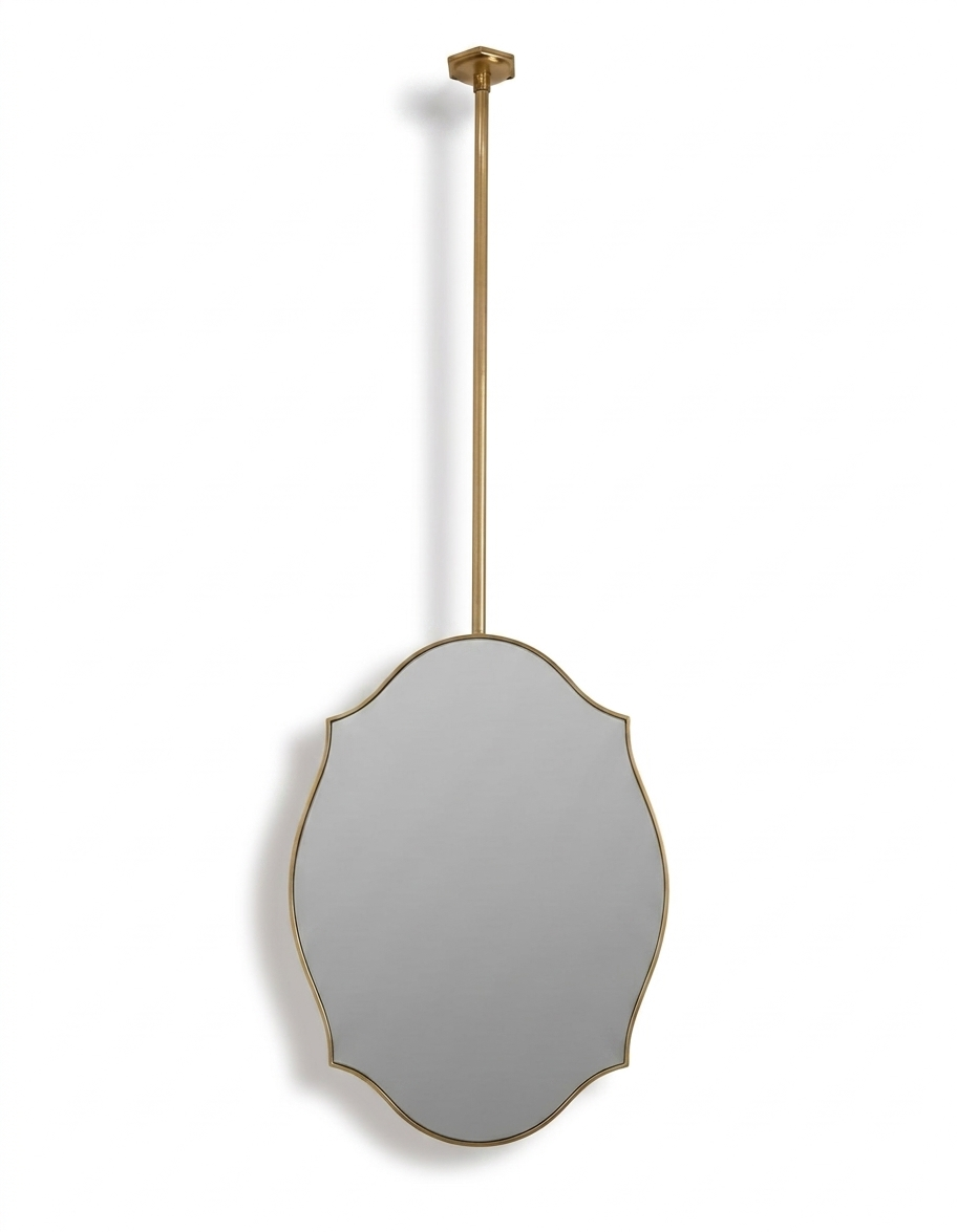 Handmade suspended scalloped shield brass mirror with slim gold frame on a white background.