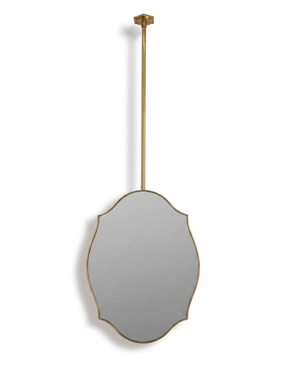 Handmade suspended scalloped shield brass mirror with slim gold frame on a white background.