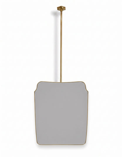 Handmade brass hanging mirror with curved crest silhouette on a white background.