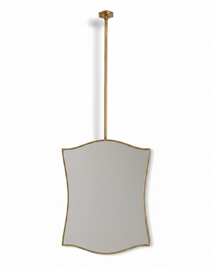 Ceiling-mounted wavy brass mirror with slim gold frame on white background