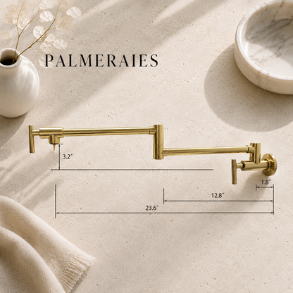 Dimension drawing of an unlacquered brass wall-mounted pot filler faucet showing a 23.6-inch maximum reach, 12.8-inch rear arm, 3.2-inch outlet clearance, and 1.8-inch wall flange measurement.