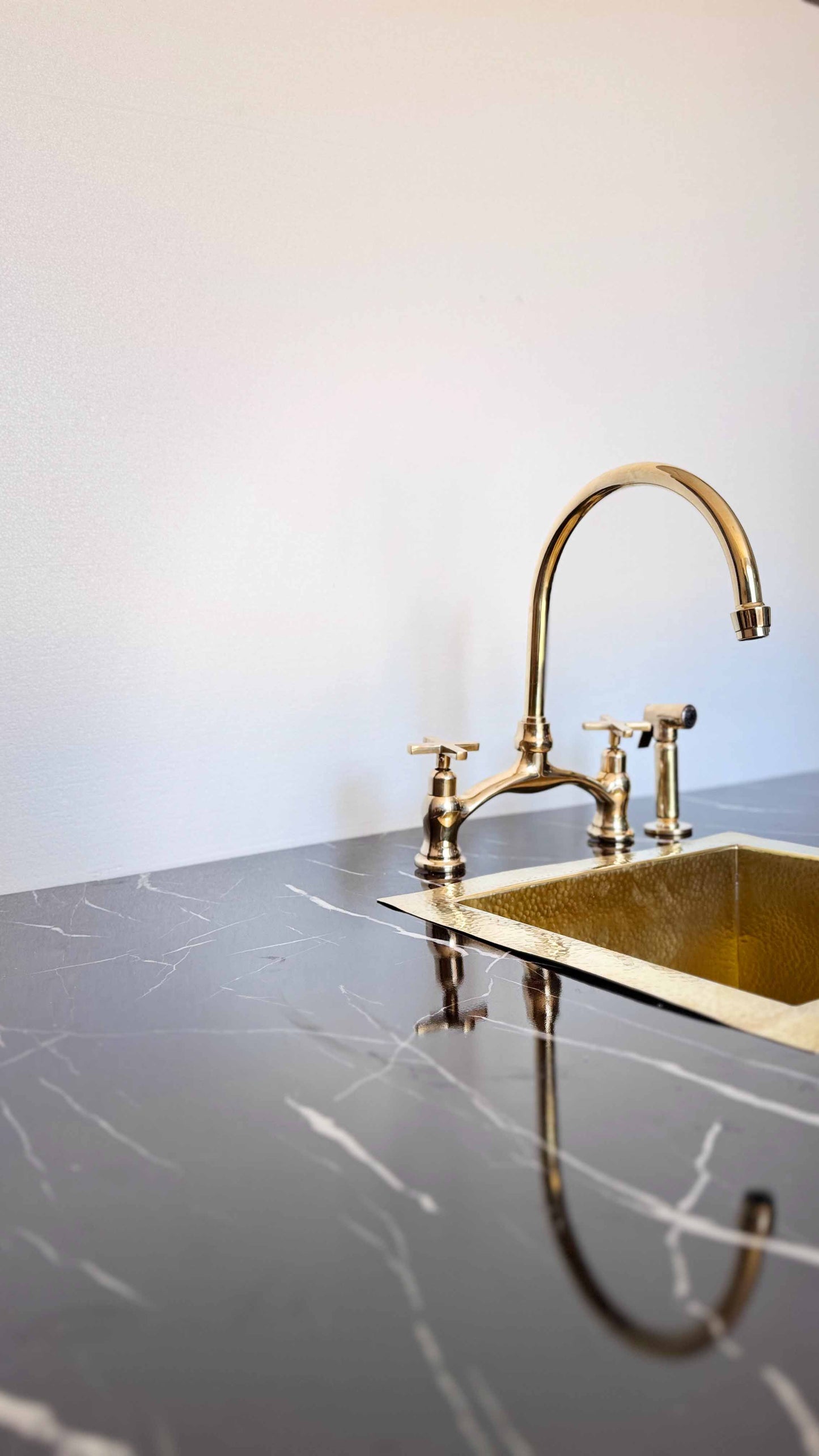 Antique Brass Kitchen Faucet in kitchen