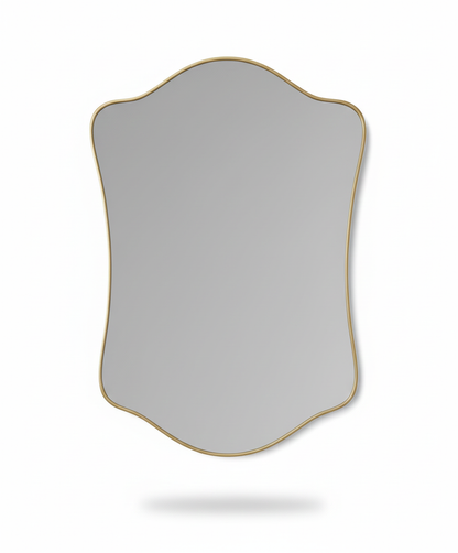 Wavy shield brass mirror on white background on white background