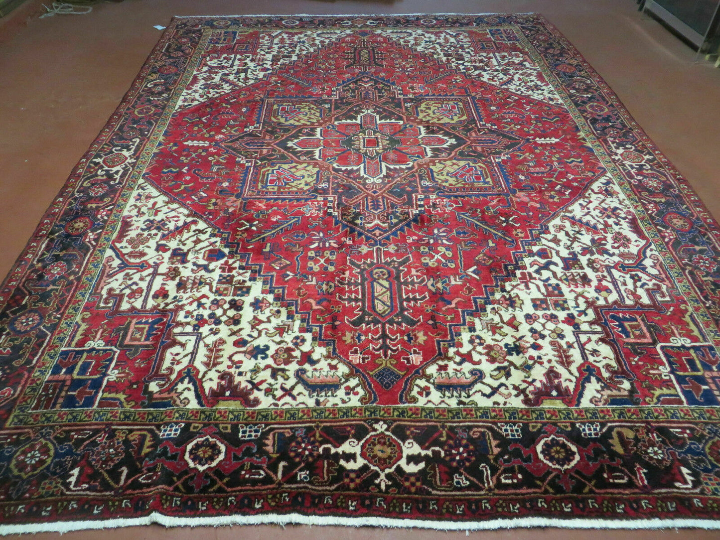 Persian Heriz Rug Hand Knotted Wool Red Ivory Dark Blue 8 Foot 6 Inch By 11 Foot Geometric Medallion Semi Antique