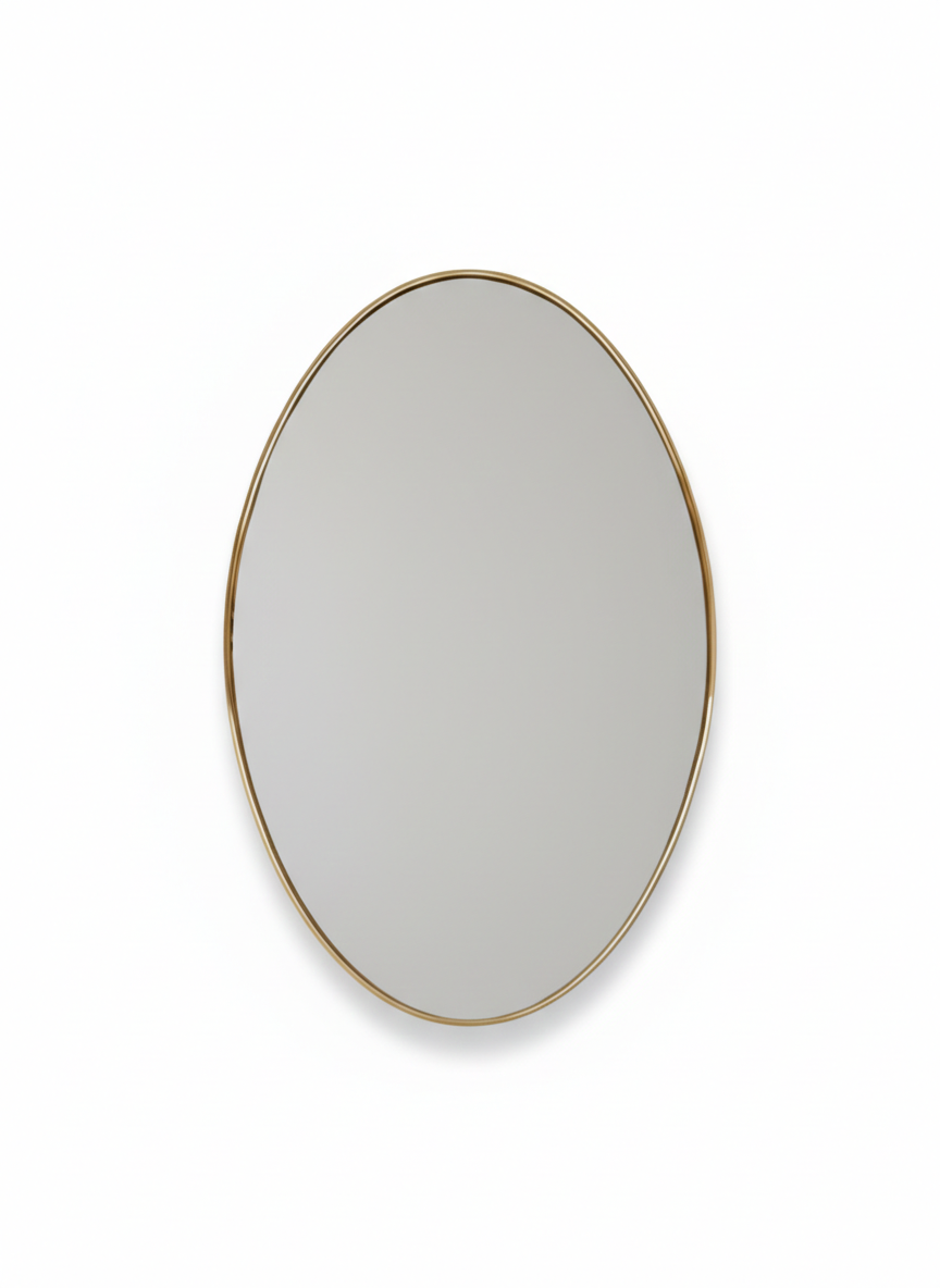 oval brass mirror on white bacground 