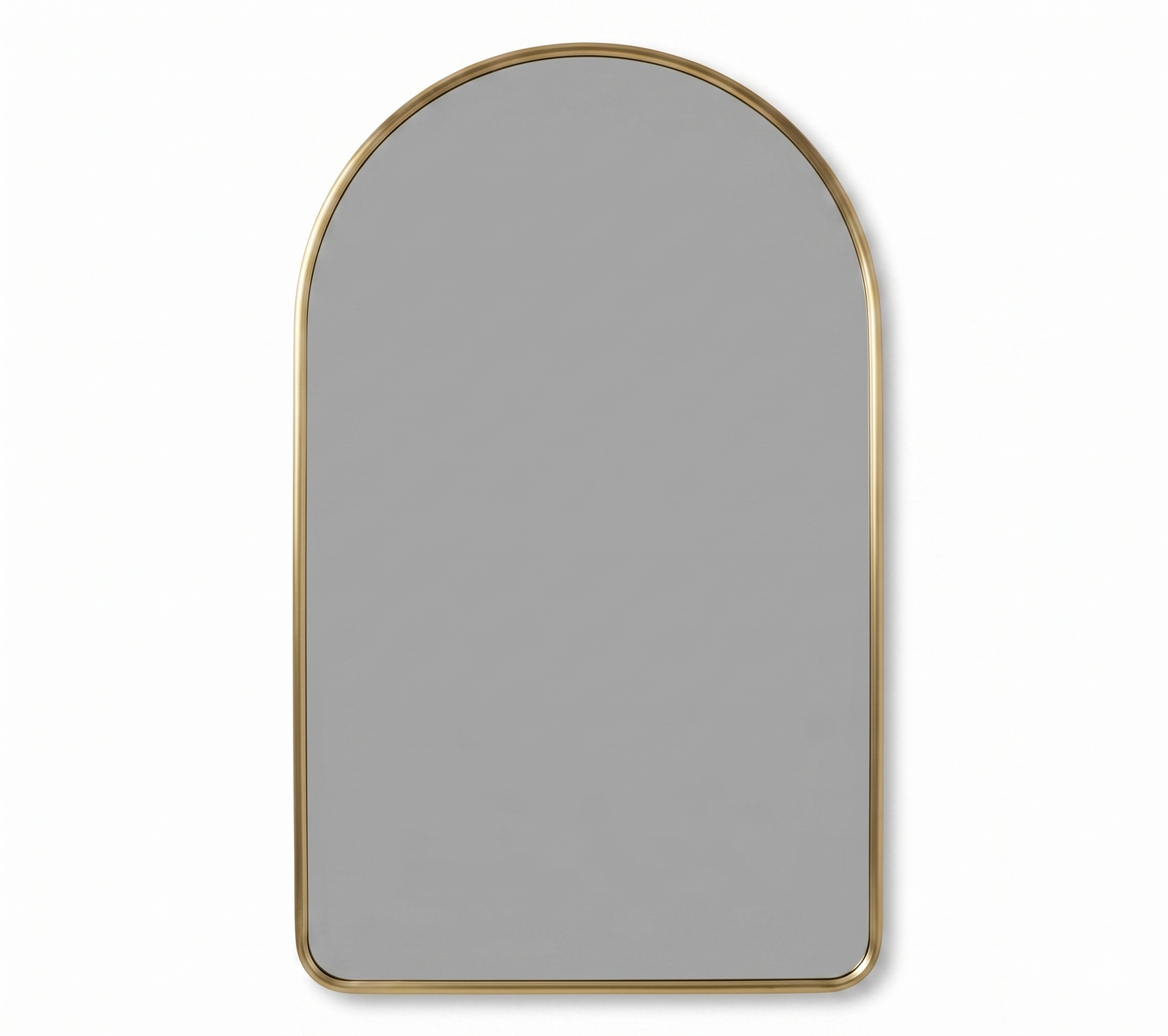 Simple arched brass mirror with slim gold frame on white background