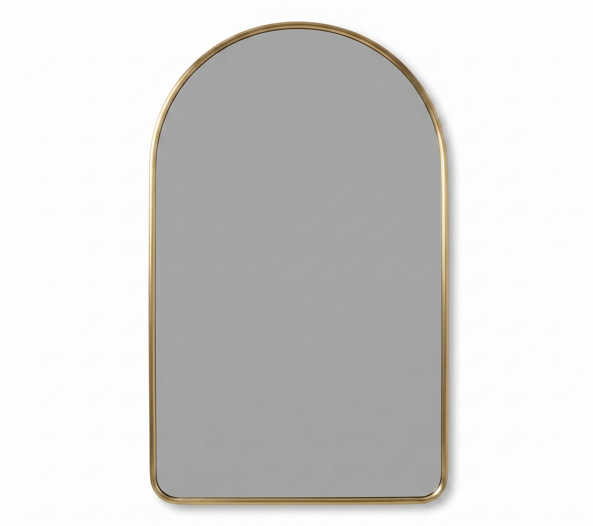 Simple arched brass mirror with slim gold frame on white background