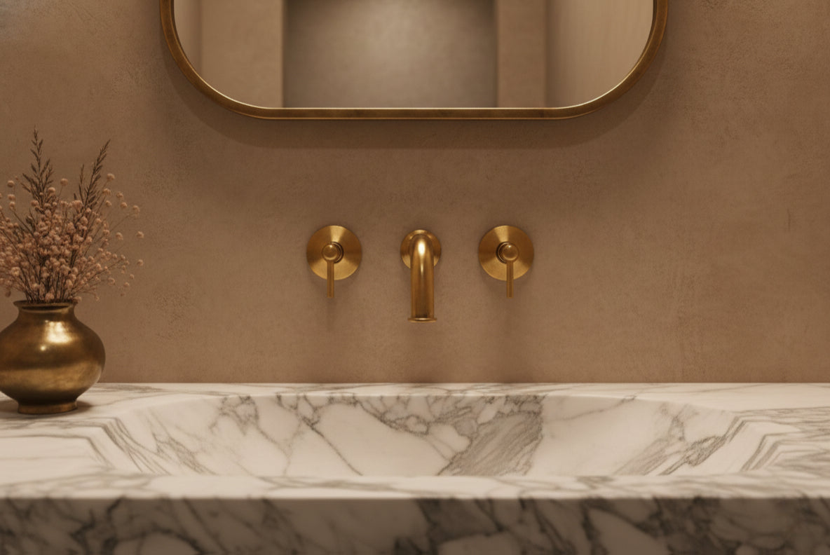 Marble integrated sink with brass wall mixer and minimal decor