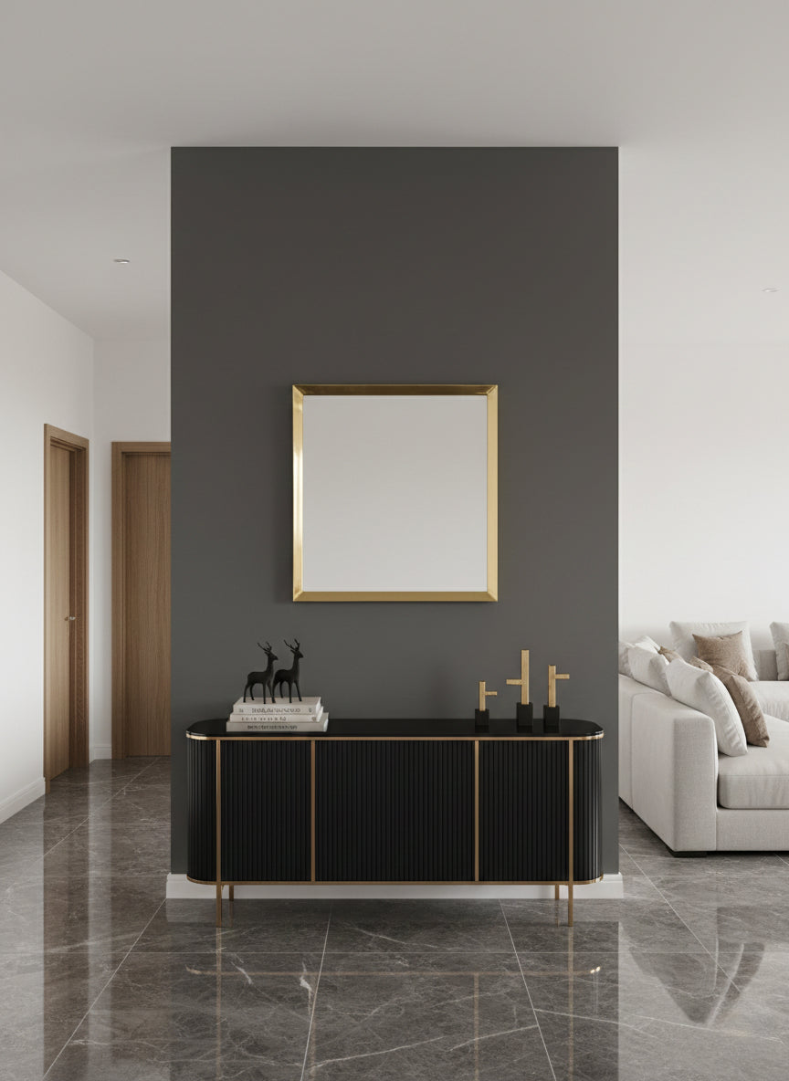 Gold square mirror on dark accent wall in modern living space
