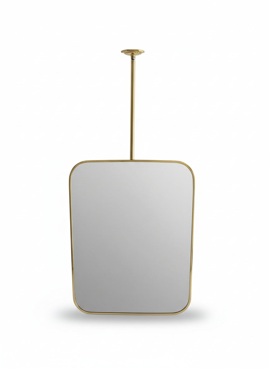 Rounded rectangle brass ceiling mirror with slim brass frame.