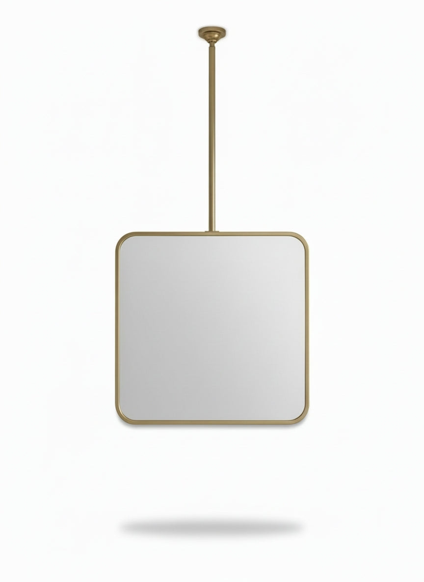 Handmade suspended square brass mirror isolated on white background.