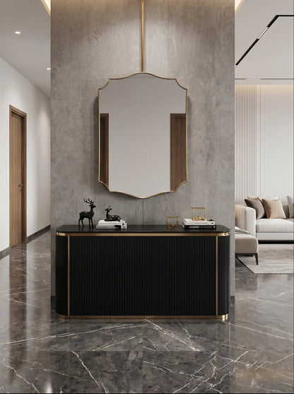 Suspended gold brass mirror with decorative crest silhouette