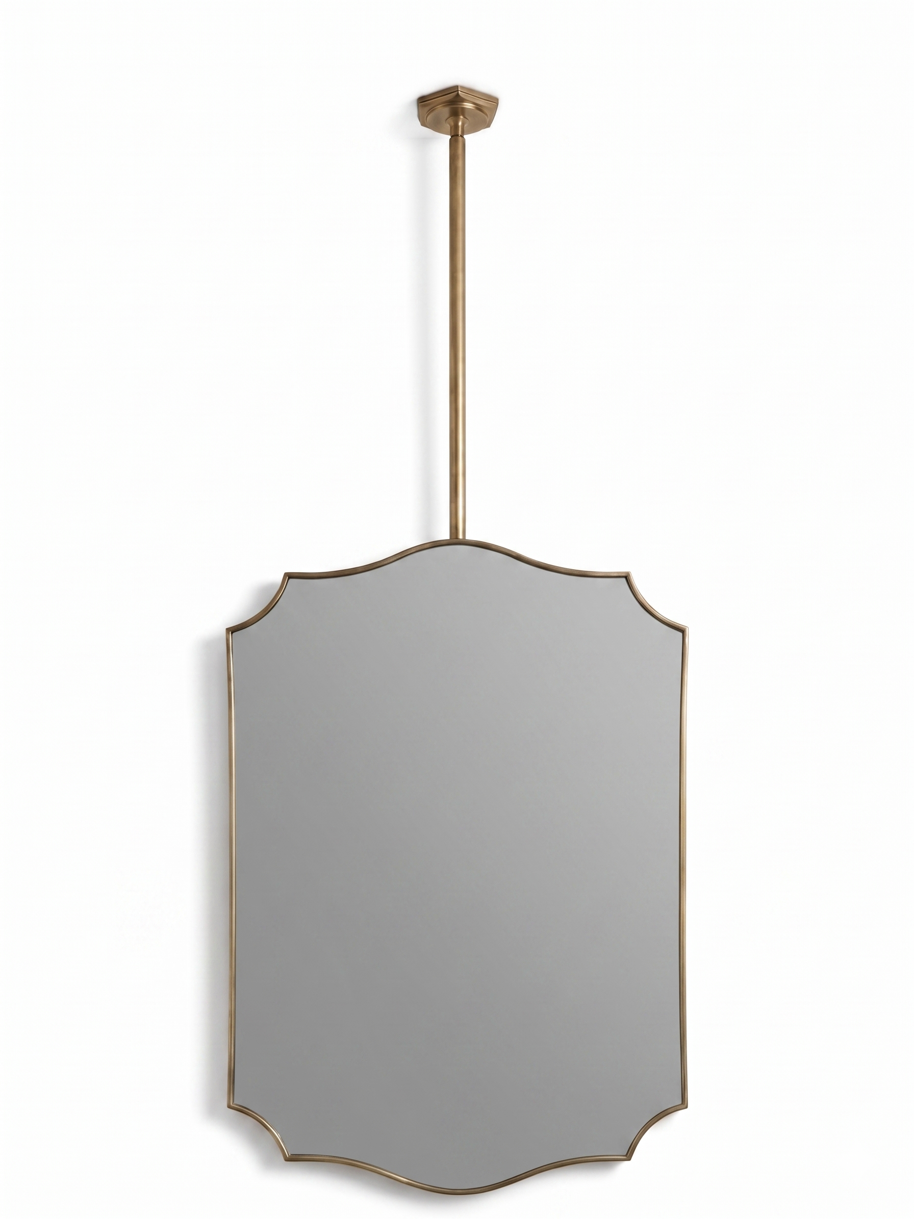 Handmade gold brass suspended crest mirror on white background