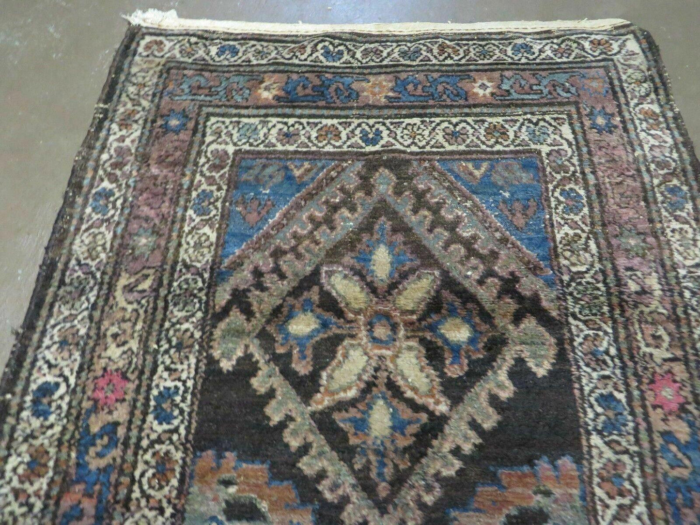 Antique Handmade Wool Rug From India With Floral Oriental Design