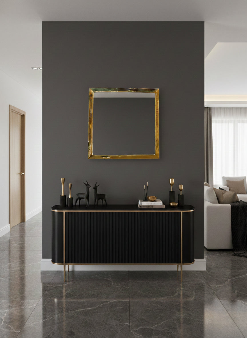 Modern entryway with square brass mirror above black console