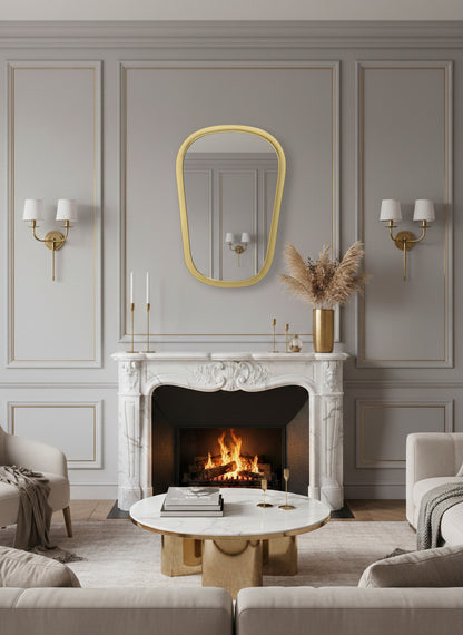 Brass mirror above fireplace in elegant living room