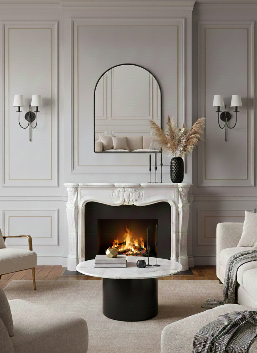 Italian arch brass mirror above fireplace