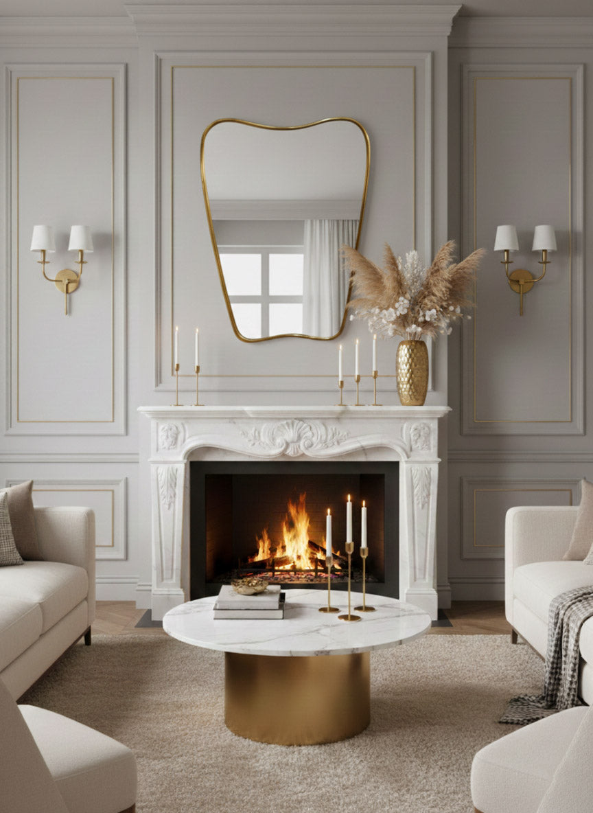 Italian curved brass mirror above marble fireplace in classic living room