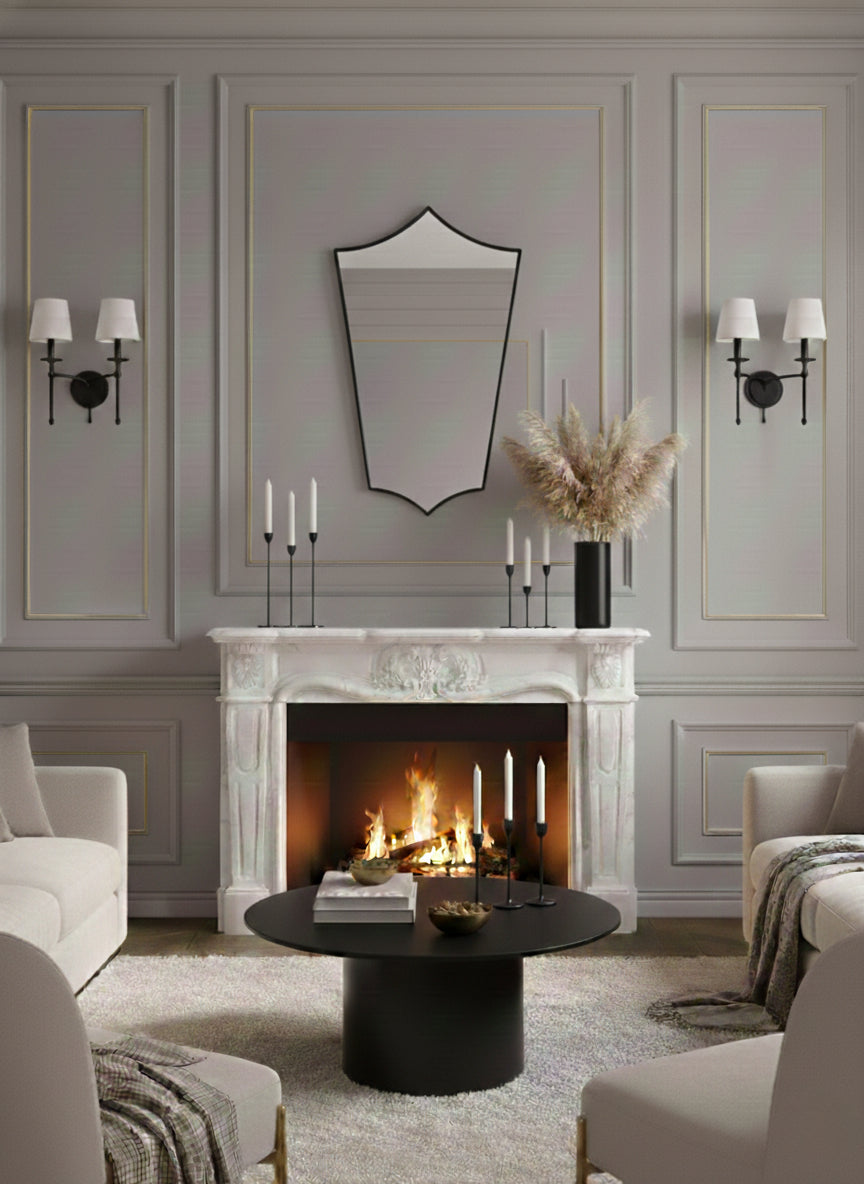 Brass mirror above fireplace