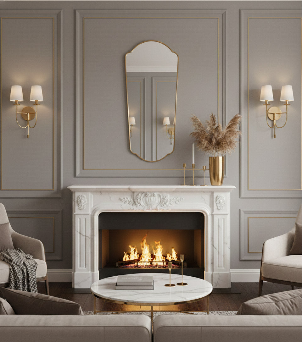 Elegant full length brass mirror above classic fireplace mantel.