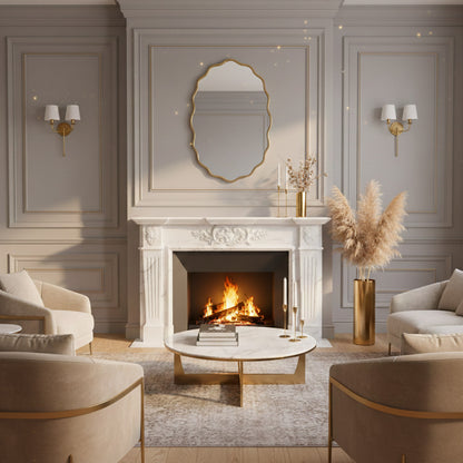 Oval wavy gold mirror over fireplace in classic living room.
