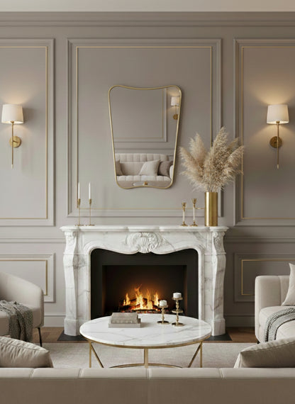 Butterfly brass mirror over marble fireplace mantel