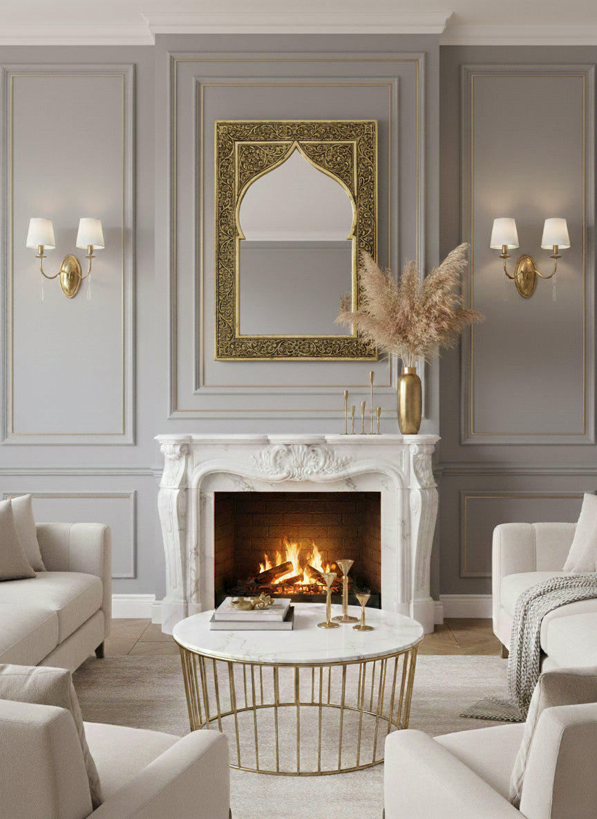 Ornate brass arch mirror above fireplace