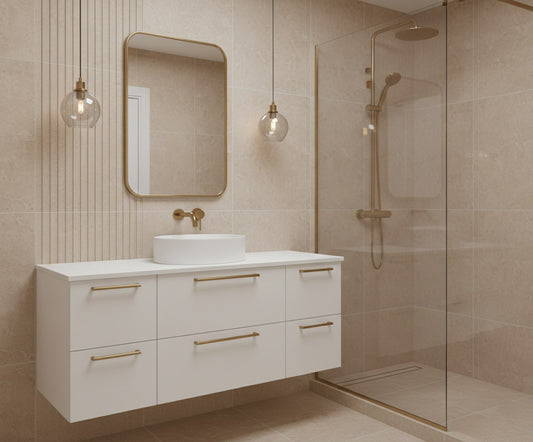 Rectangular brass vanity mirror in modern bathroom with glass shower