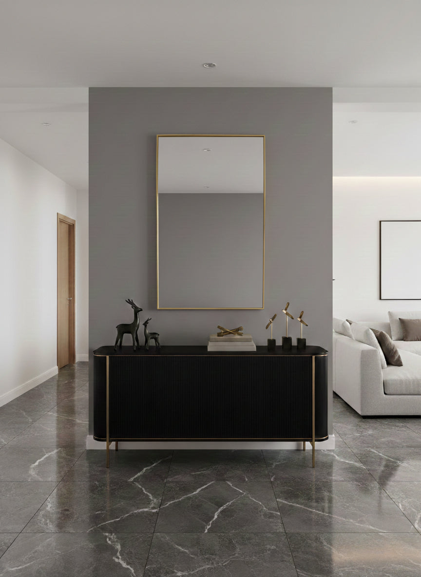 Triangle brass mirror in contemporary hallway interior