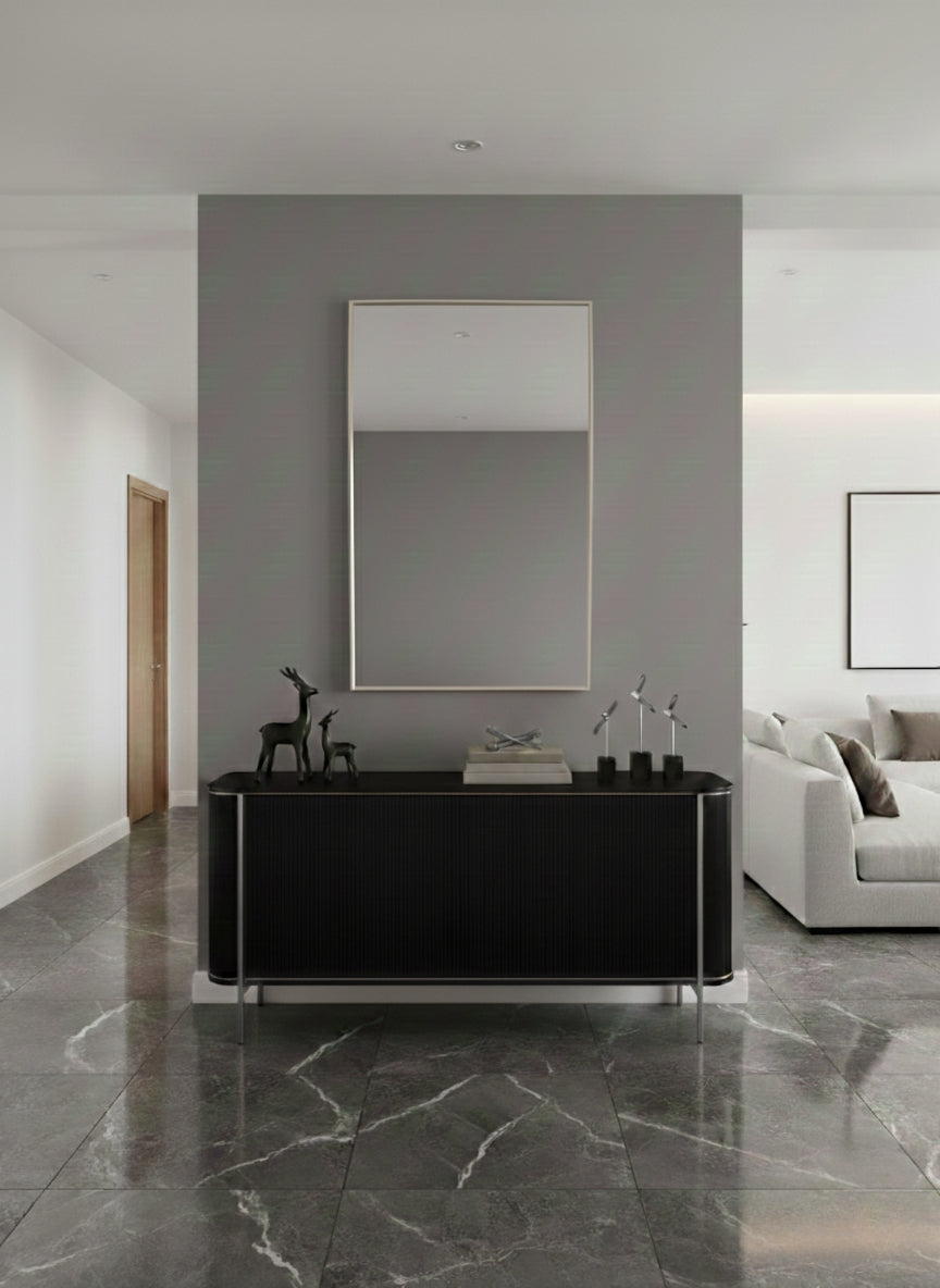 Modern rectangular mirror above black console table.