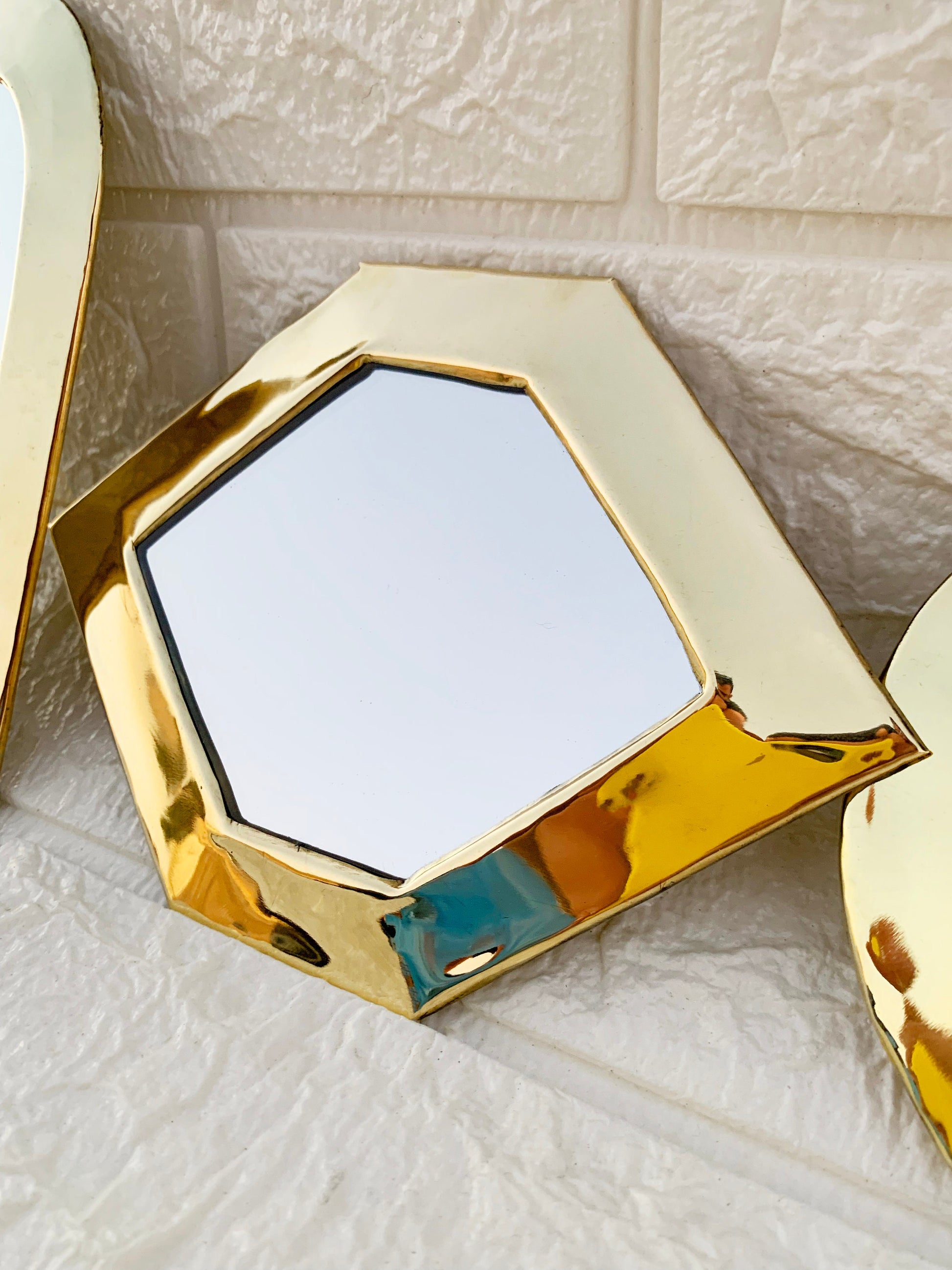 a close up of a mirror on a table