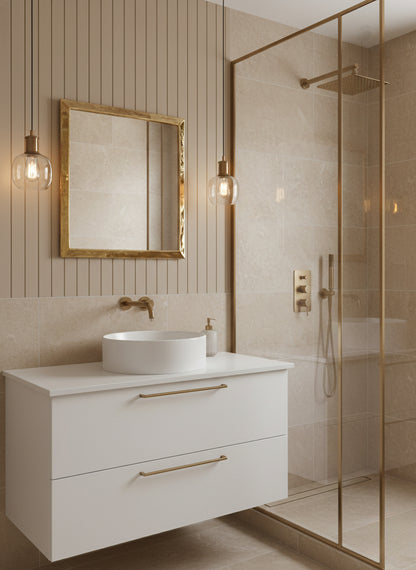Contemporary bathroom with square brass mirror and glass shower
