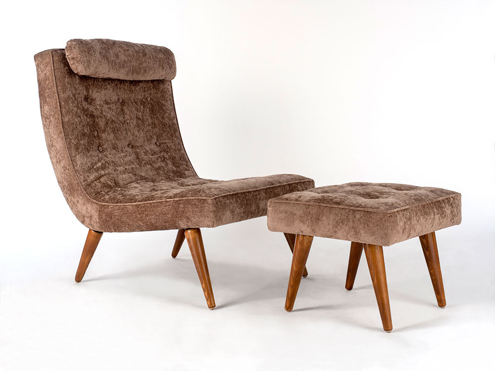Brown upholstered chair with matching ottoman on a white background