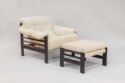 Beige armchair and ottoman set on a light gray background