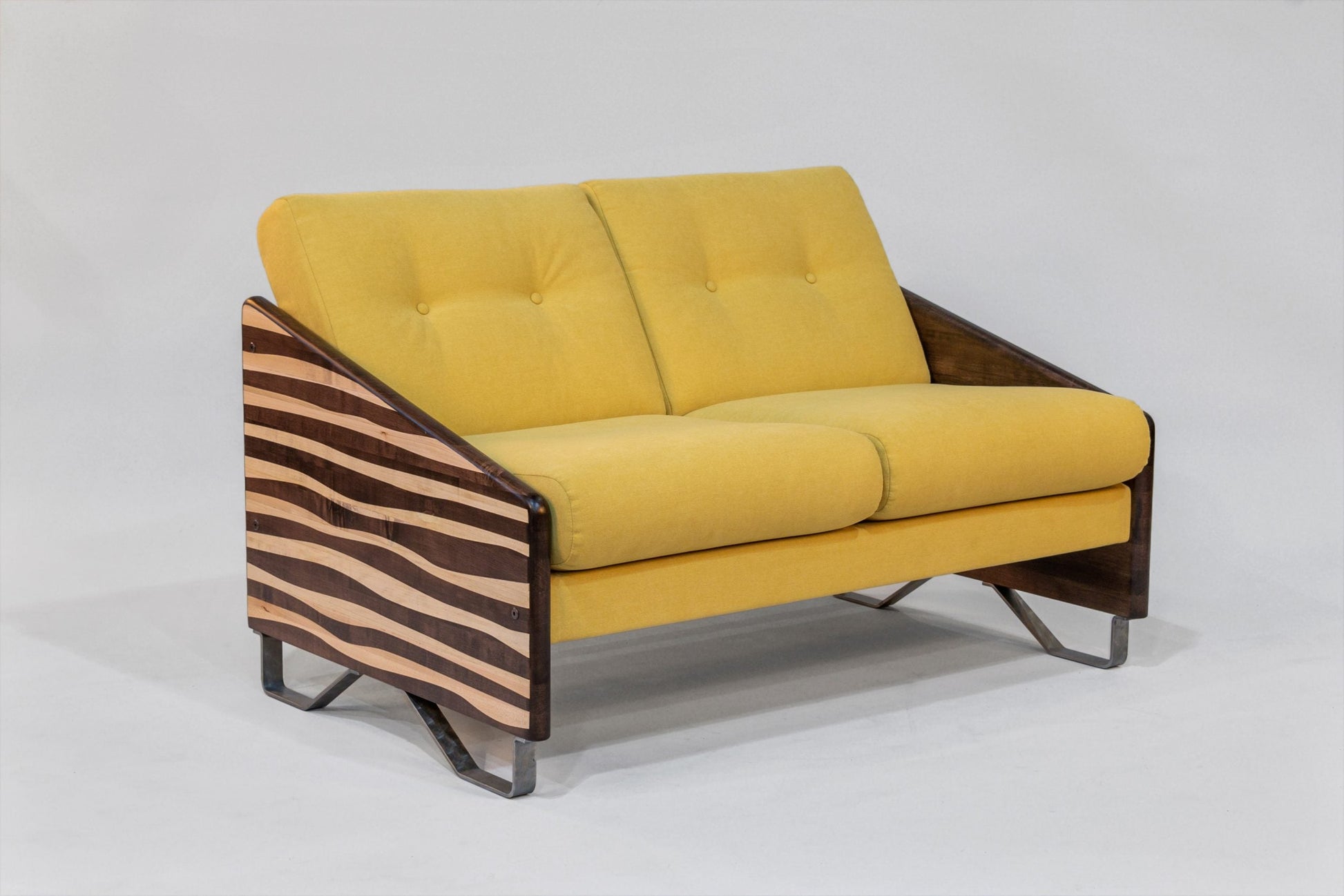 Yellow sofa with wooden frame and zebra pattern on a white background