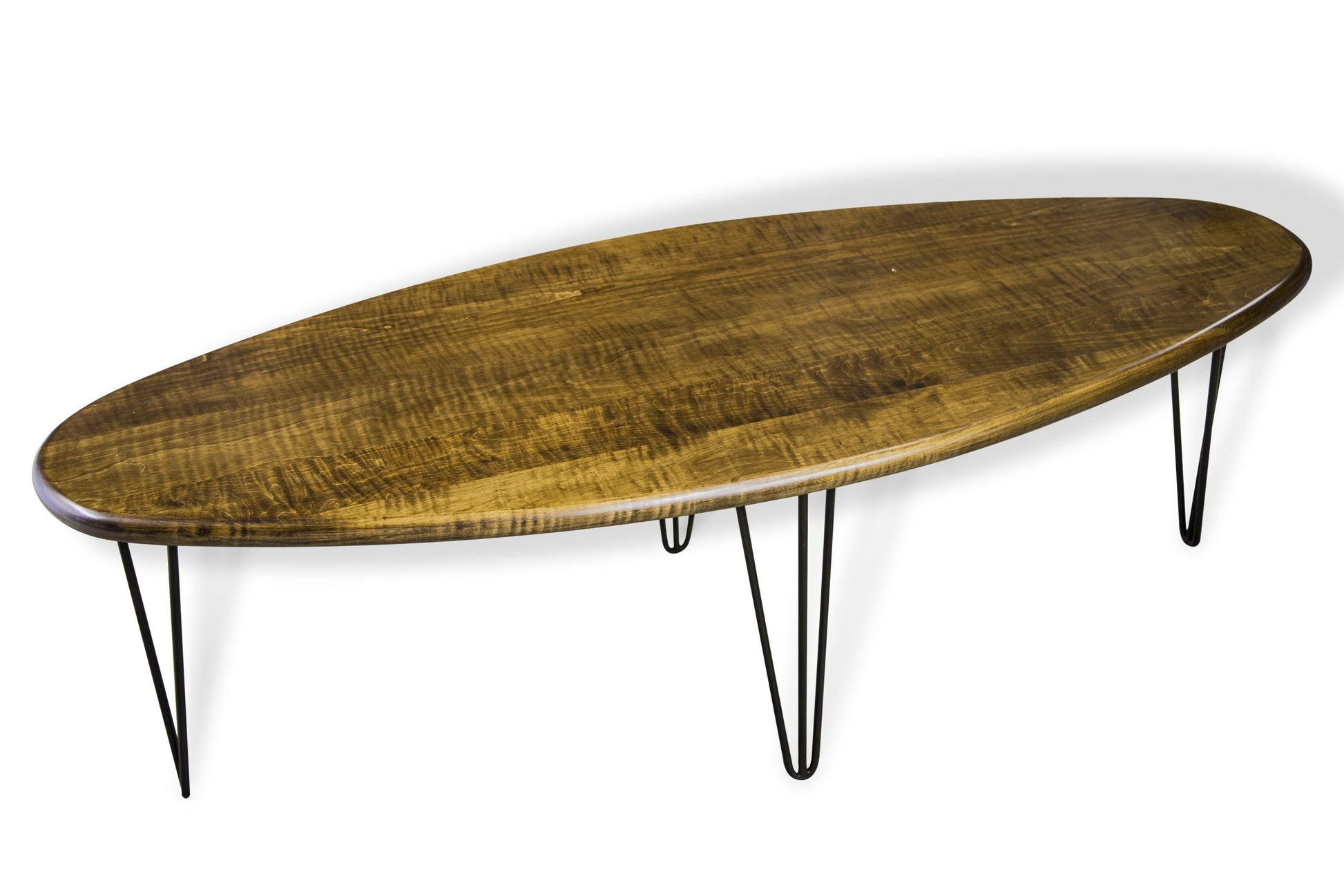 Wooden coffee table with hairpin legs on a white background